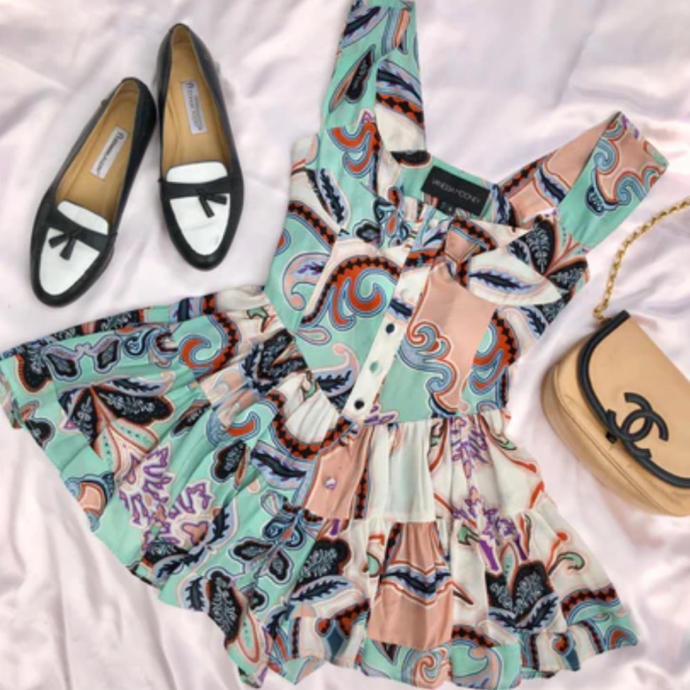 NWWT VANESSA MOONEY FLOWY ROMPER